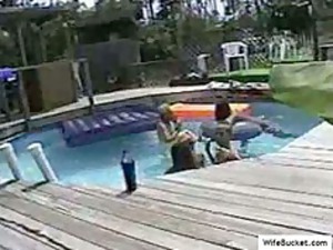 swinger group fuck in the swimming-pool